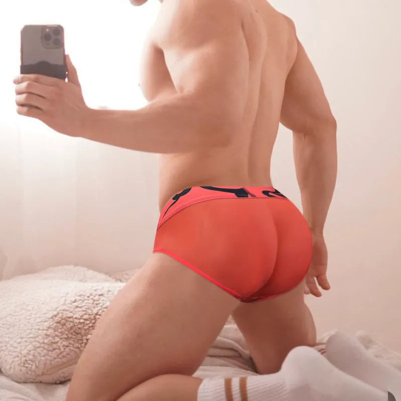 Men's solid colour cotton boxer shorts on a white background, showing low-waist design.
