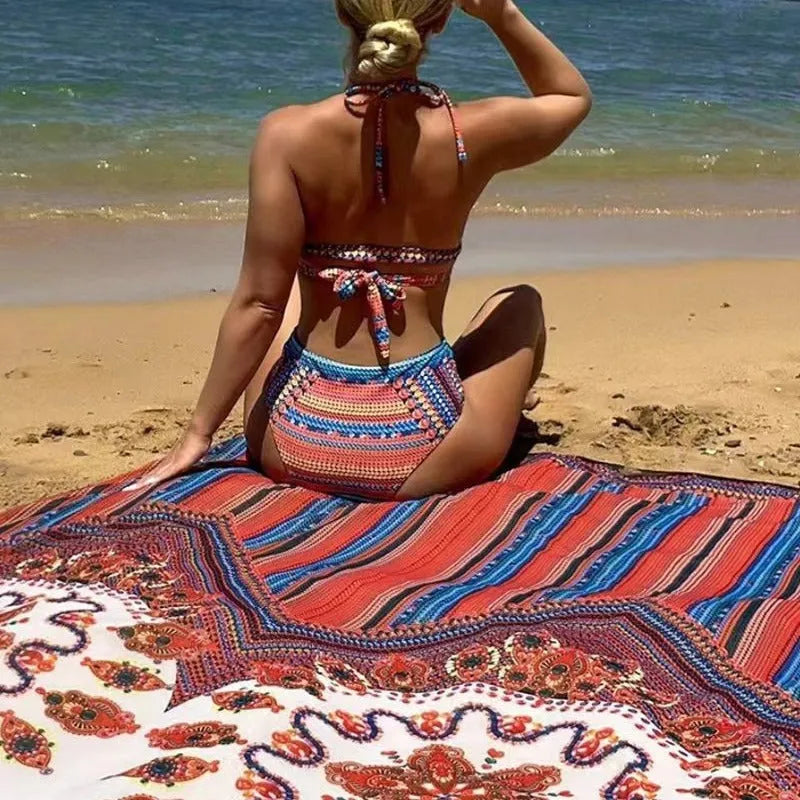 Women's three-piece swimsuit set showing a cutout blouse, high-waisted briefs, and a matching coat on a neutral background.