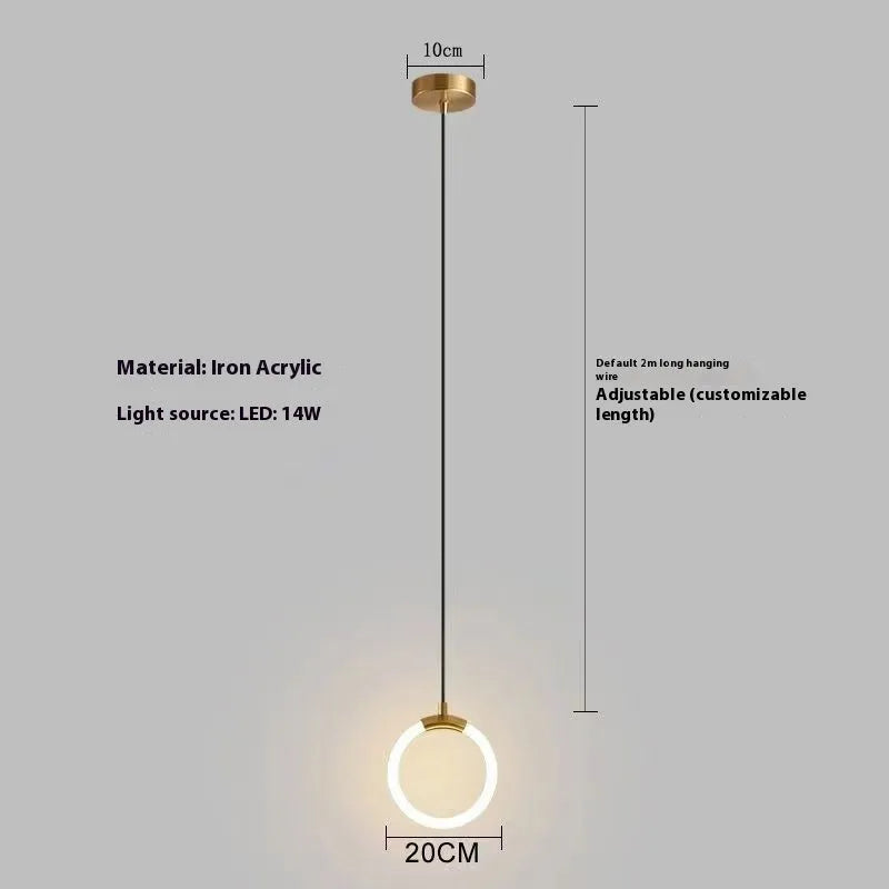 Compact Nordic minimalist U-shaped white pendant light with fabric cord, shown mounted beside a bed.