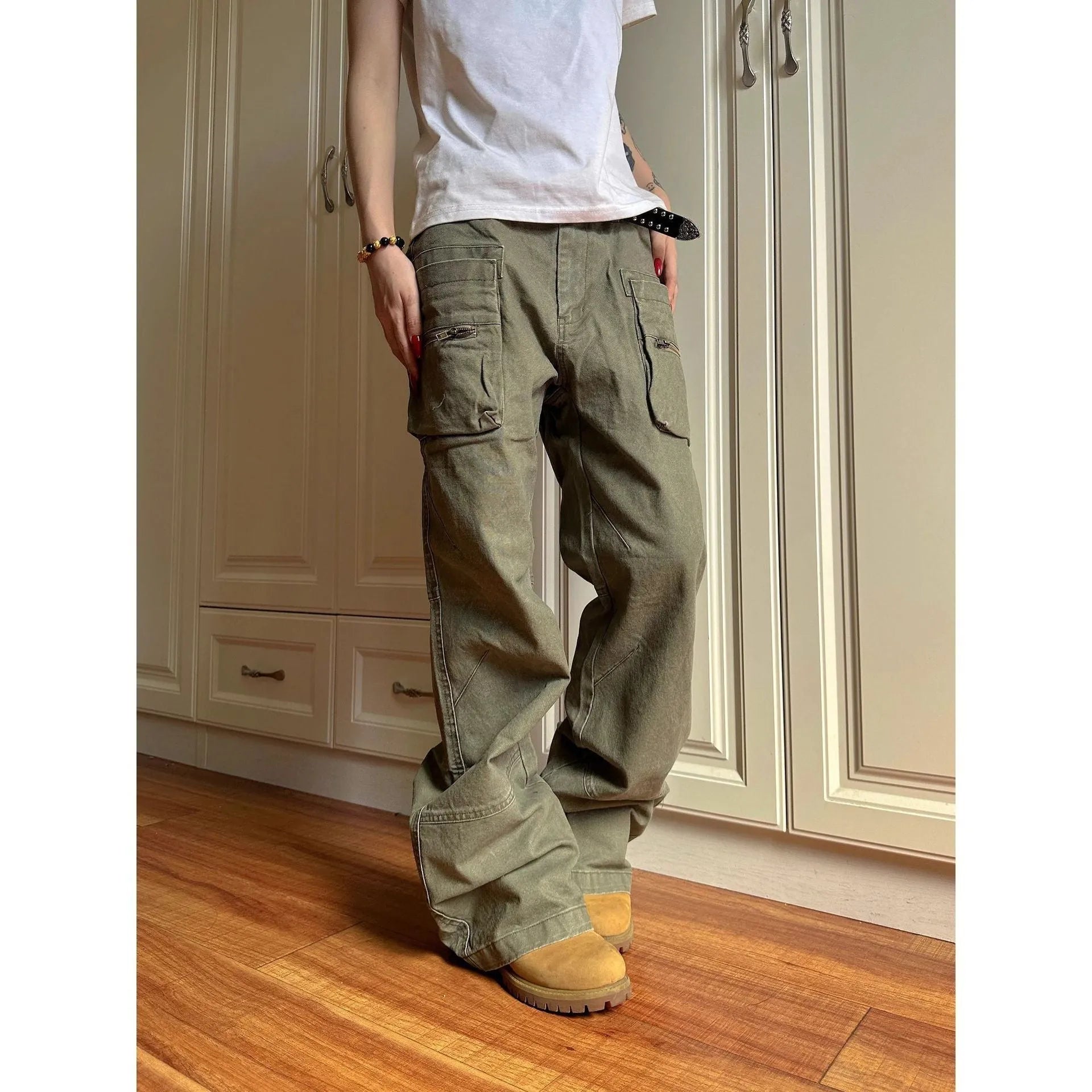 Green double zipper cotton workwear casual pants with a pocket, shown in mid-waist overalls style.
