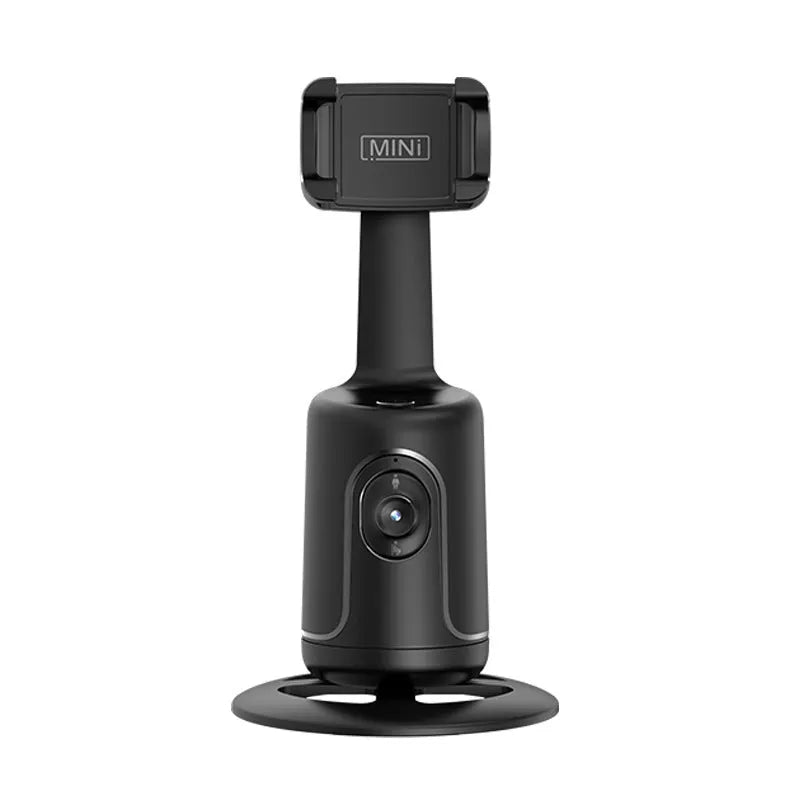 Automatic tracking stabiliser with 360-degree rotation in black, pink, and white on a desktop