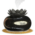 Pure black round lotus aromatherapy humidifier with USB cable connection and mechanical controls