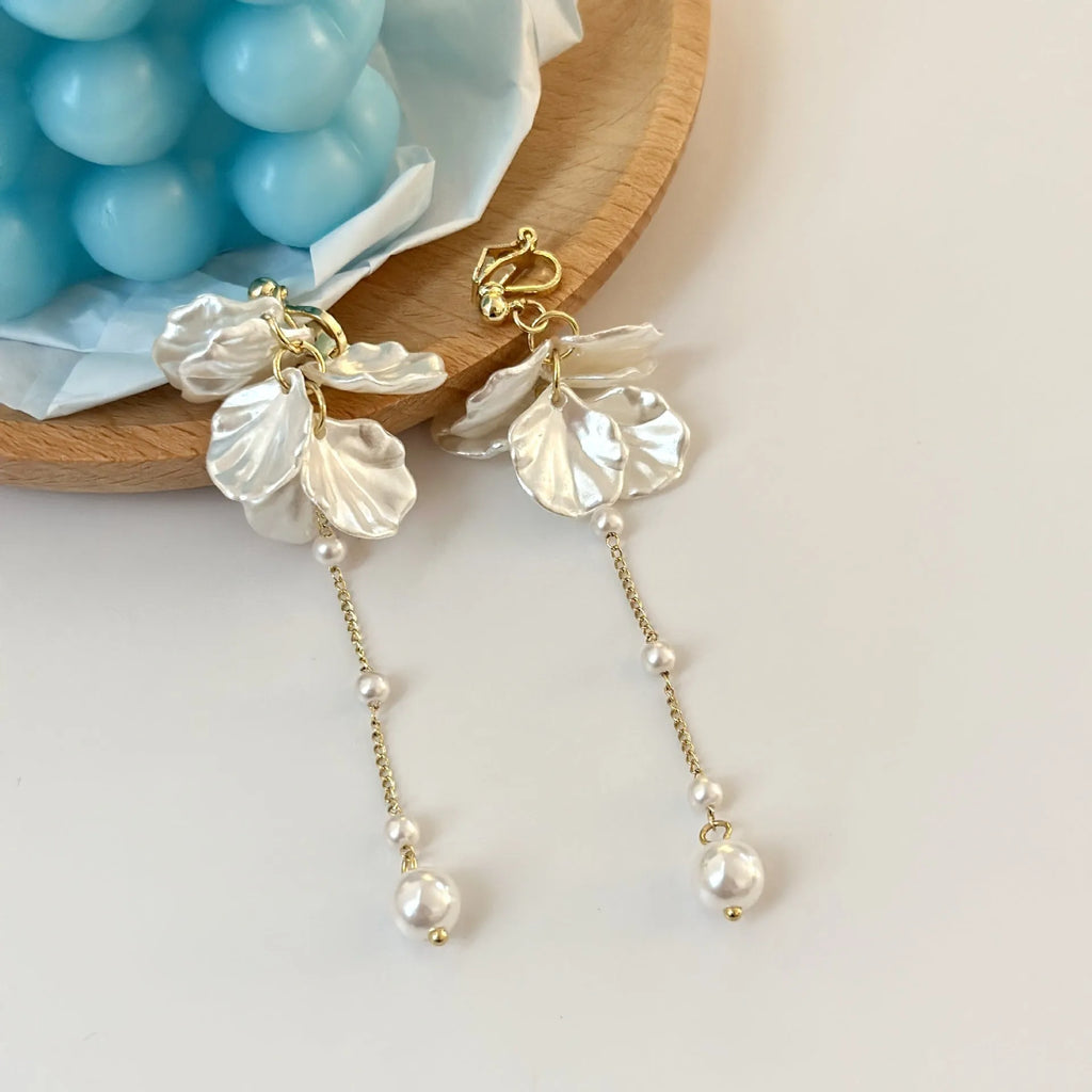 Women's casual acrylic shell pearl tassel drop earrings with choice of four clip types, 8.8cm long.