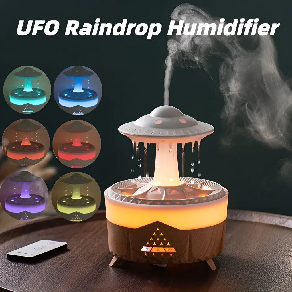 UFO cloud-shaped humidifier with LED lights and water droplet effects on dark surface