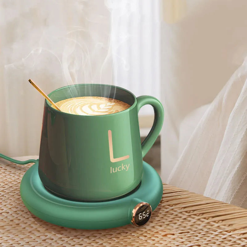 White USB coffee mug warmer plate on wooden desk with measurement showing 130x110mm dimensions