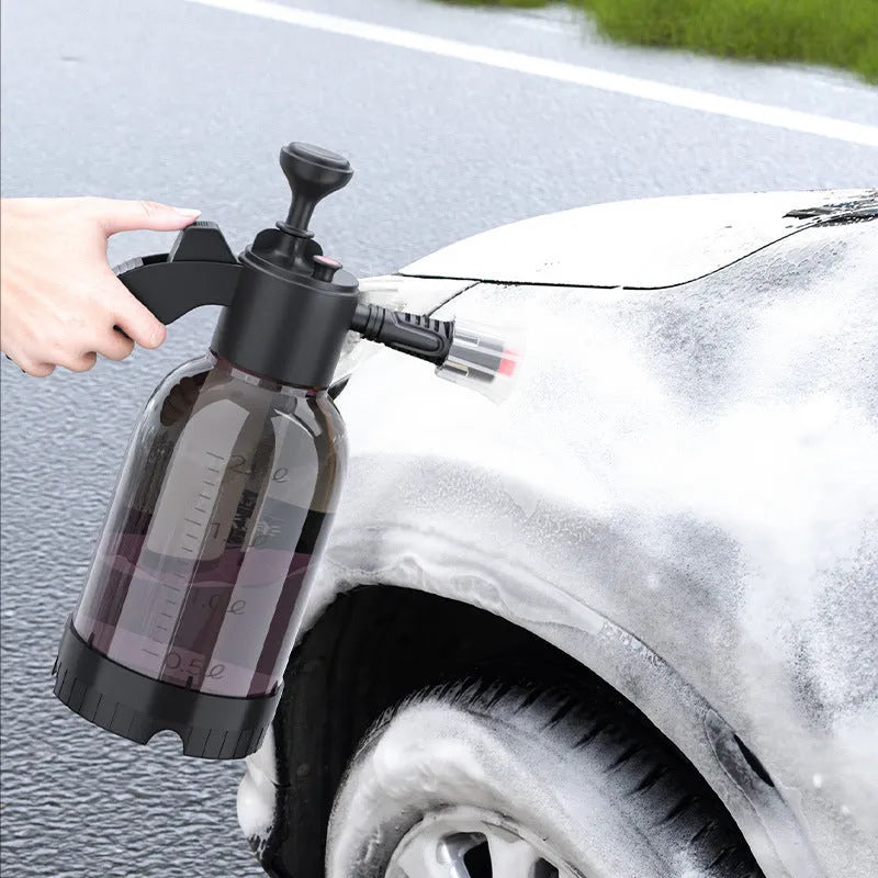 Black hand-held 2-litre foam sprayer with pump handle and two nozzles for car washing and gardening