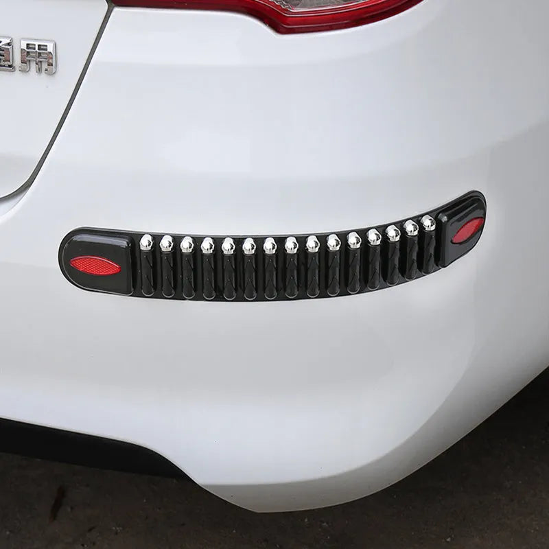 Set of four widened thickened PVC car bumper strips in black with stick-on backing for vehicle bumper protection