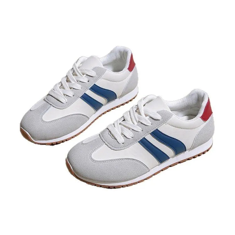 Blue and grey striped Cortez-style casual shoes with round toe and flat rubber sole