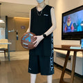 Light grey polyester basketball vest and shorts sports suit laid flat
