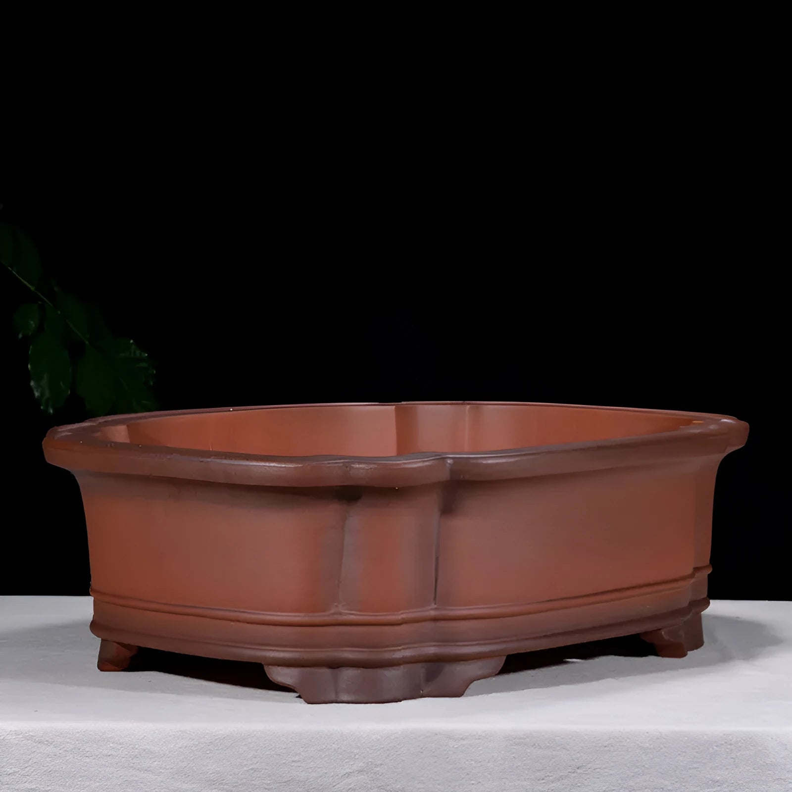 Large antique finish purple clay rectangular flowerpot with carved Chinese tree stump, pine, cypress, and fruit designs.
