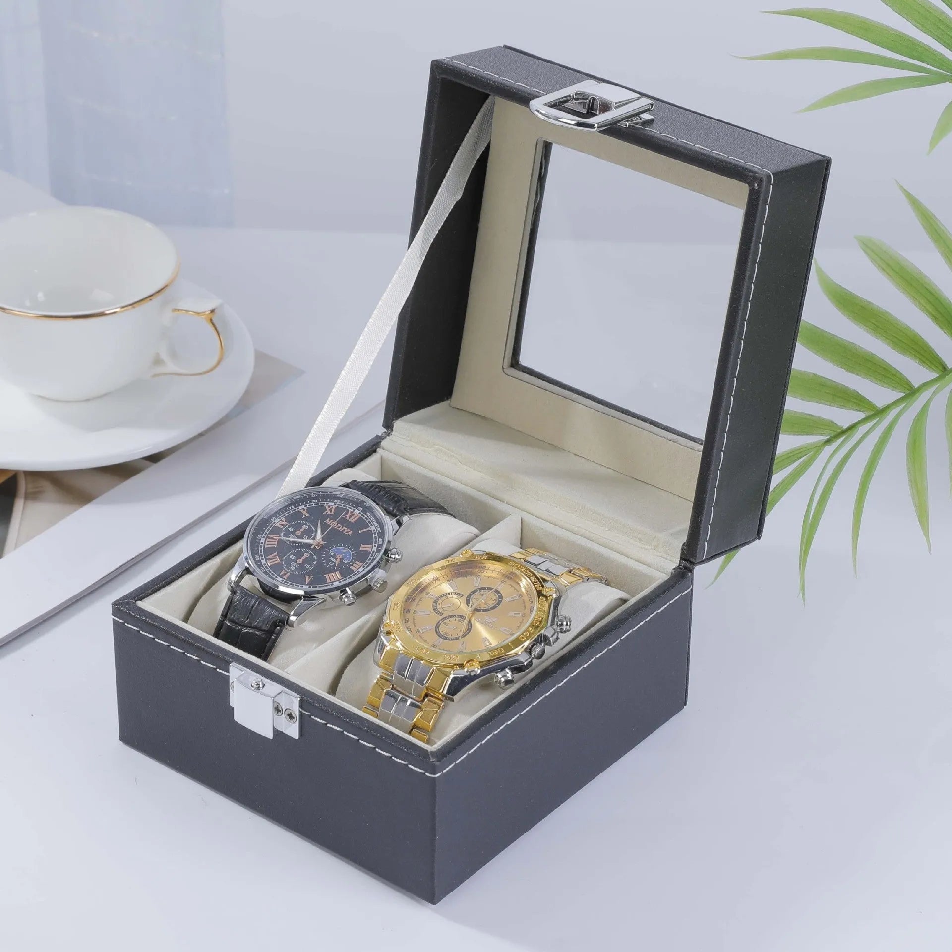 Grey high-grade leather watch storage box with see-through lid showing multiple watch slots.
