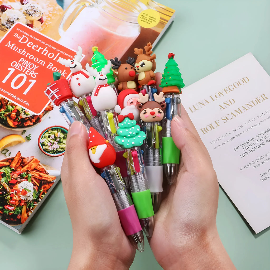 Compact 11cm Christmas ballpoint pen with four colours and festive designs like snowmen and reindeer.