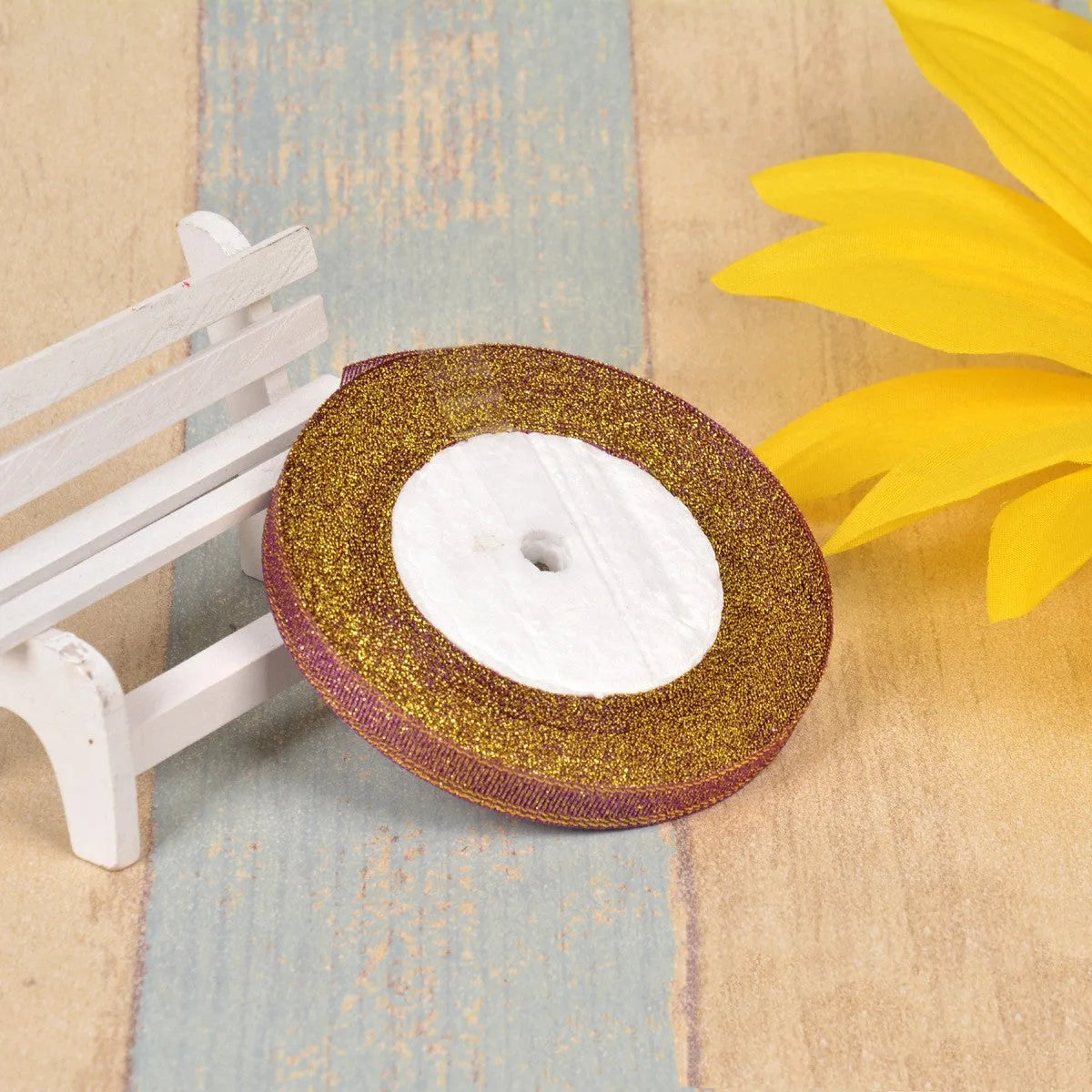 Colourful green onion pattern polyester ribbon spool with metallic gold or silver wire detailing.