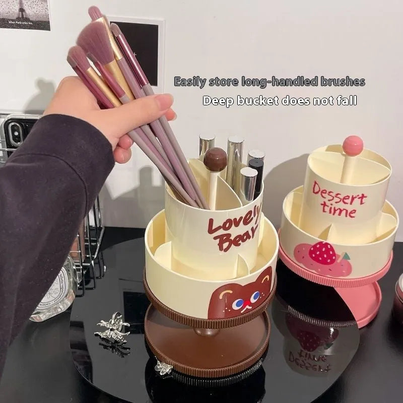 Beige rotating cosmetic brush storage barrel with open lid showing internal organiser rack