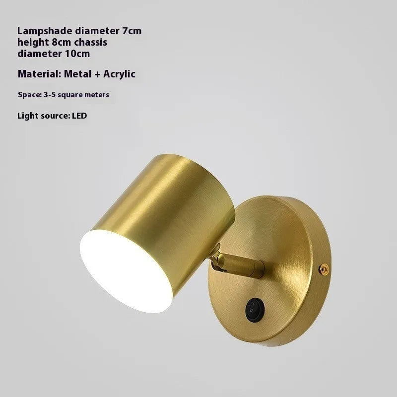 Rotatable bedside wall lamp with golden mirror front in gold finish mounted on wall