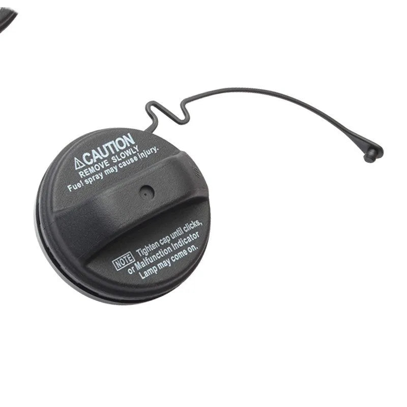 Toyota snap-in type fuel tank cap replacement auto part on white background
