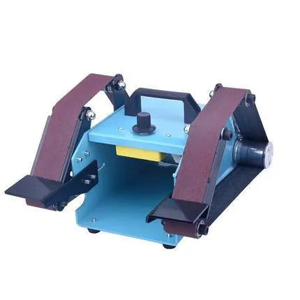 Blue desktop dual-axis belt sander with variable speed switch, shown on a workbench.