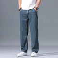 Men's loose fit straight-leg Lyocell jeans in a blue colour with a zip fly.