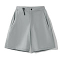 Men's solid colour sports shorts with a 3D cut, shown in army green, laid flat to show design.