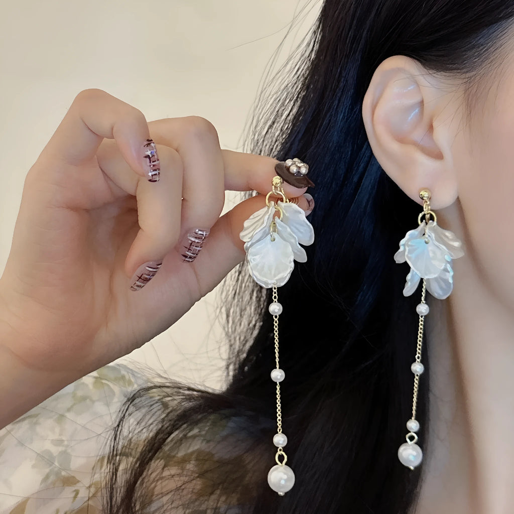 Women's casual acrylic shell pearl tassel drop earrings with choice of four clip types, 8.8cm long.