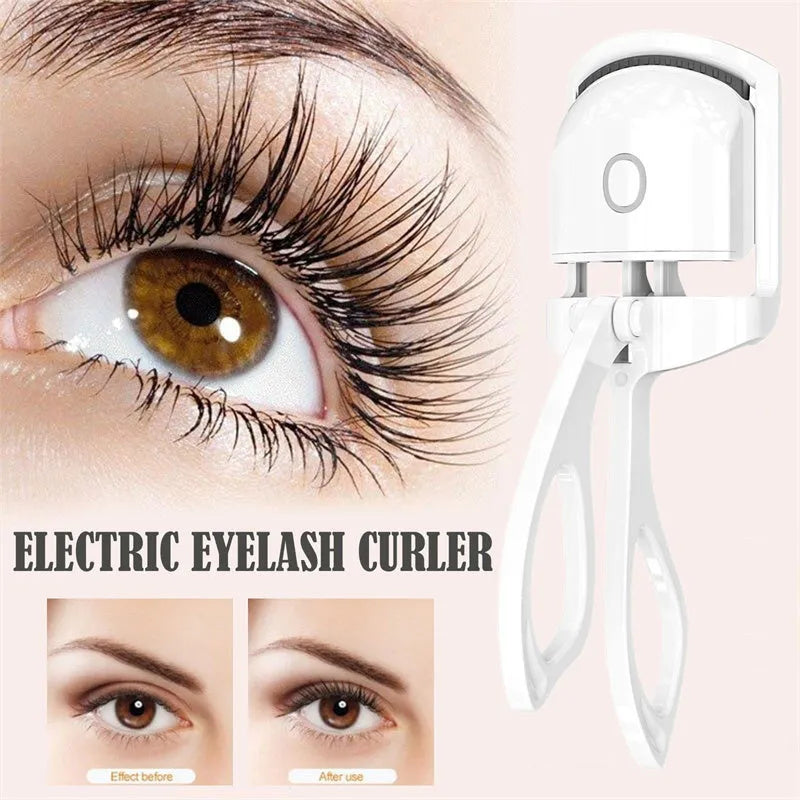 White USB rechargeable heated eyelash curler with a curved design and a small LED light.