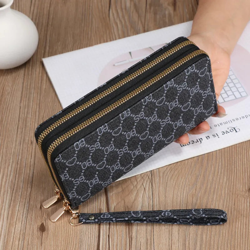 Retro-style long PU leather wallet clutch with printed design showing mobile phone compartment and zipper closure