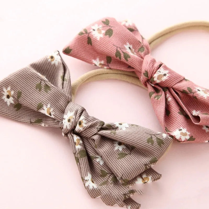 Children's knotted bow hair ring in cloth with Princess series styling