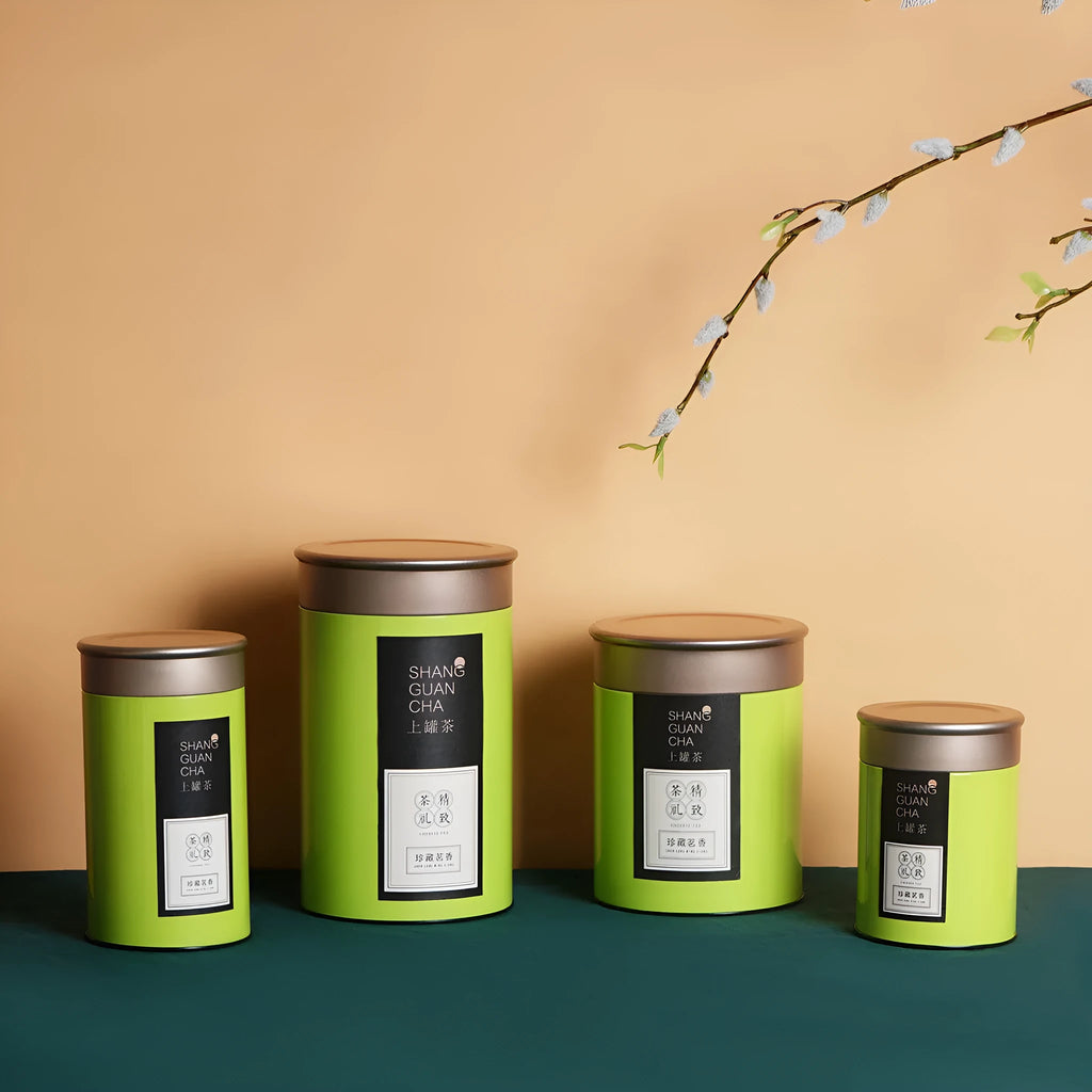 Green tinplate tea packing box with sealed lid, 150ml capacity for loose leaf tea storage.