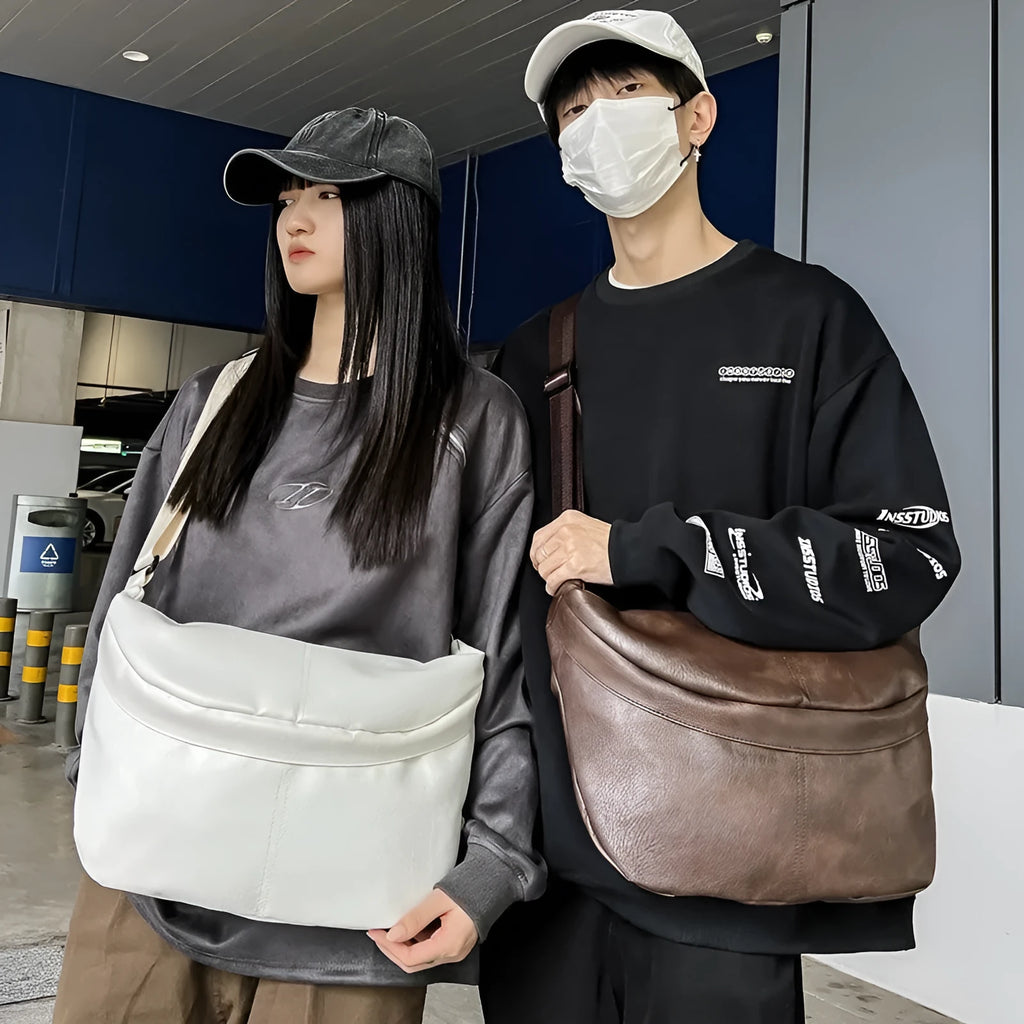 Brown men's retro-style crossbody bag made of PU leather with large capacity.