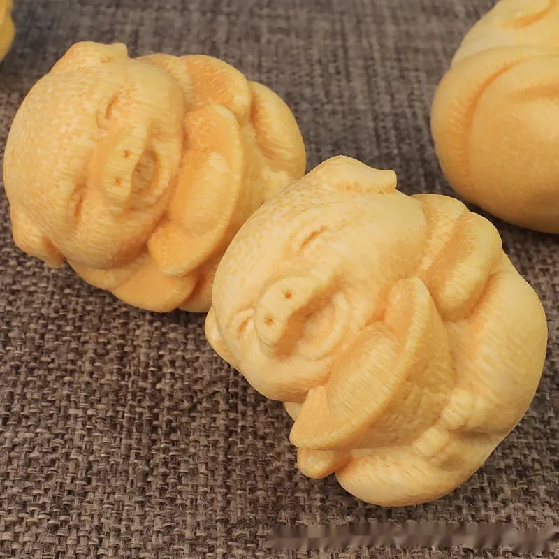 Solid bamboo carved pig ornament with traditional Chinese carving techniques measuring 4cm height