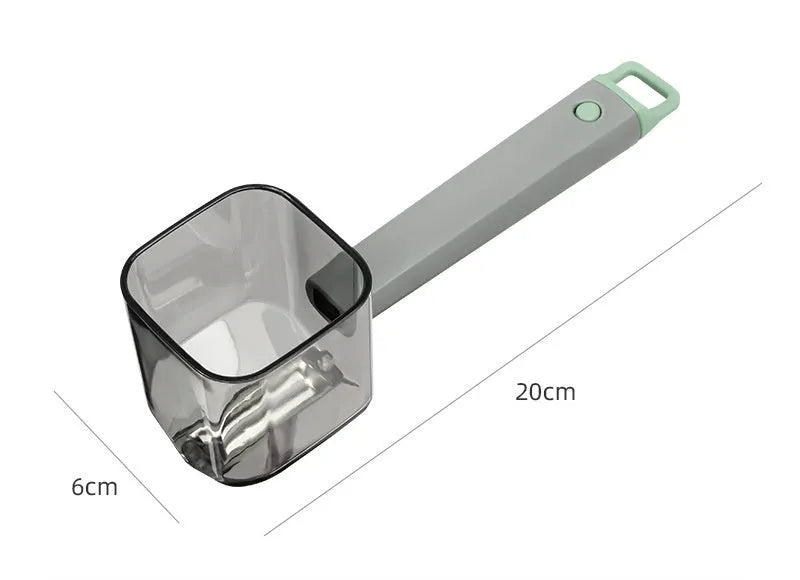 Creative green stainless steel and plastic vegetable peeler on a kitchen surface.