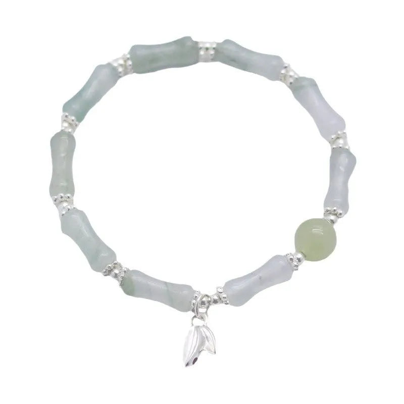 Women's antique style bracelet made from Tianshan green bamboo and sterling silver with bamboo joint detailing