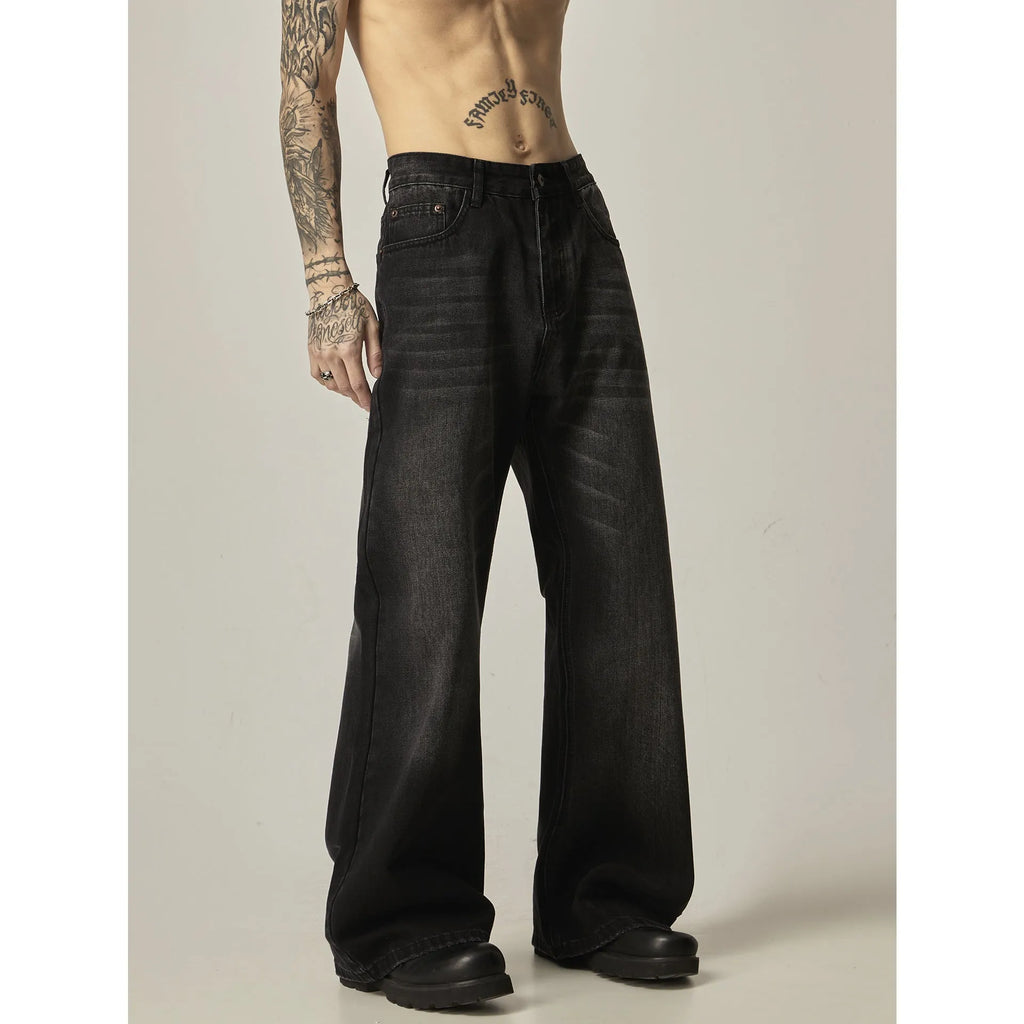 Black American retro loose straight jeans with zip fly opening on denim background
