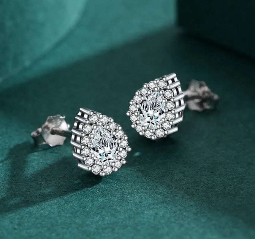 Women's silver water drop ear studs made from 925 sterling silver.