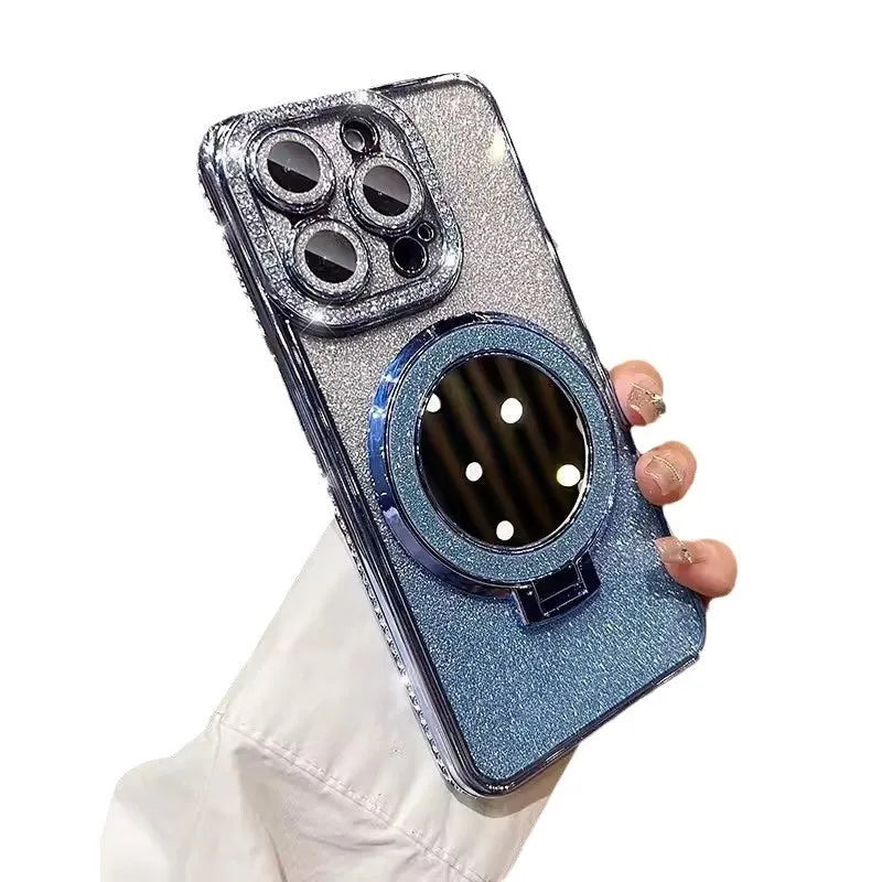 Gradient glitter phone case for iPhone with a built-in flip-out makeup mirror on a stand.