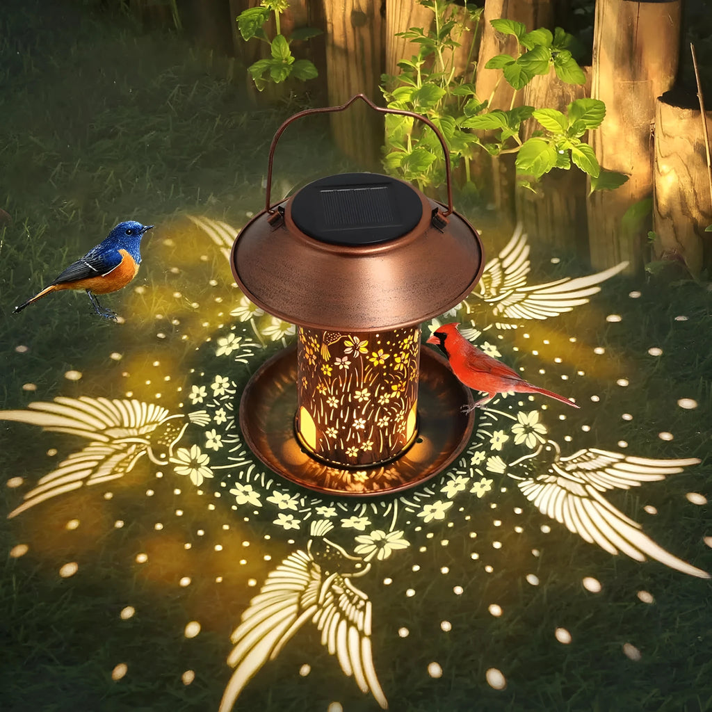 Solar powered iron art bird feeder with hummingbird pattern decoration and integrated LED lighting
