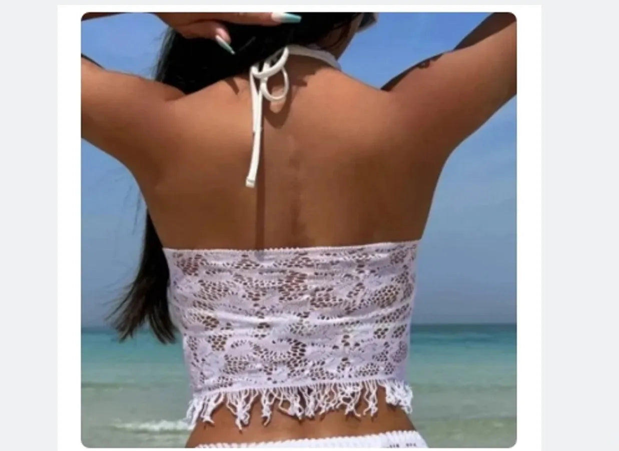 Women's white two-piece bikini swimsuit with lace briefs and matching tassel skirt beach cover-up