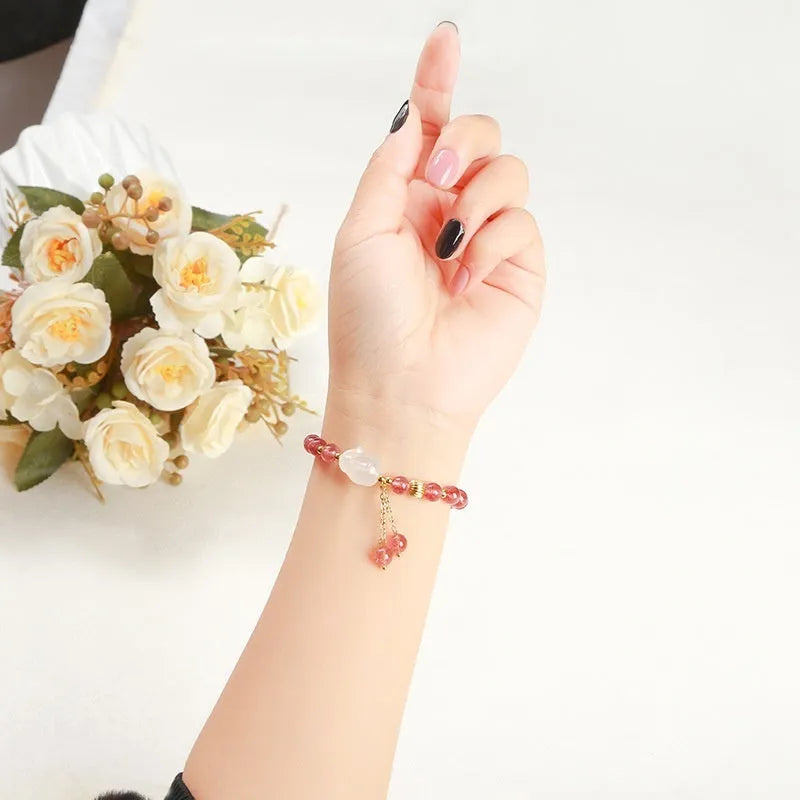 Women's strawberry quartz agate bracelet with white rabbit charms and 6mm geometric beads