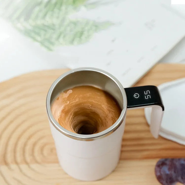 Black and white USB rechargeable electric coffee mug with LCD display and magnetic stirrer