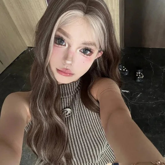 Lace front wig with long curly grey gold highlighted synthetic hair on display