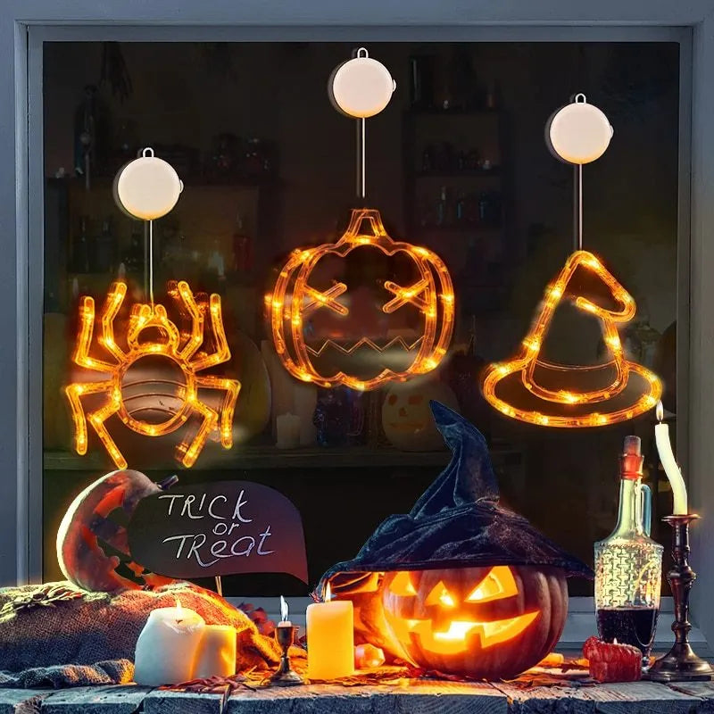 Halloween window hanging LED lights set with seven battery-powered horror-themed decorative pieces