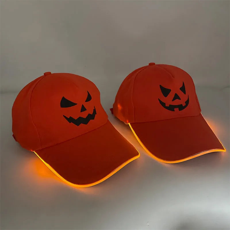 Halloween LED baseball cap with glowing coloured lights on a black cloth background.