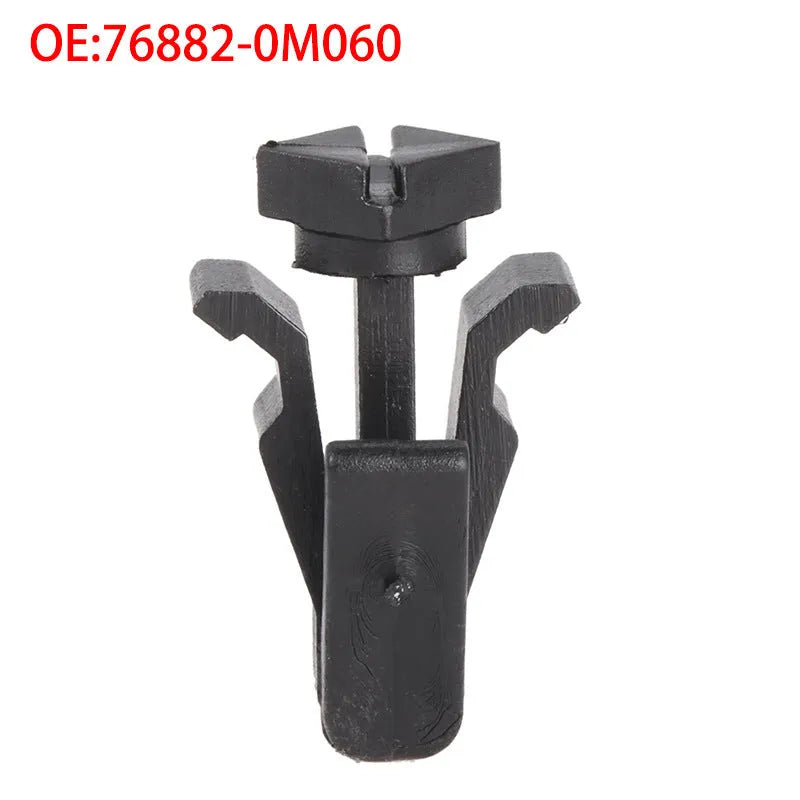 Black plastic fastening clip for Nissan bumper cover to radiator grille mounting