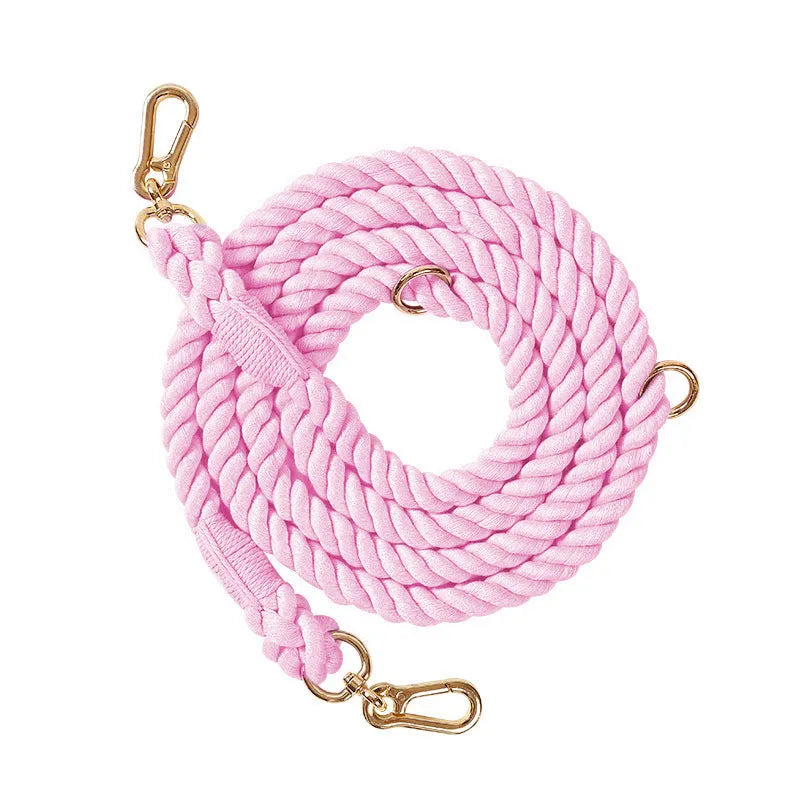 Woven rainbow double-headed dog leash with gold fittings shown at full length.