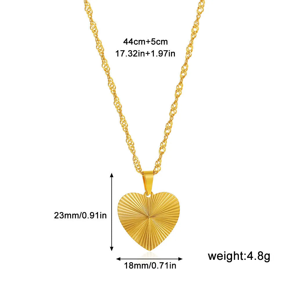 Gold pleated necklace with butterfly design pendant on water wave chain