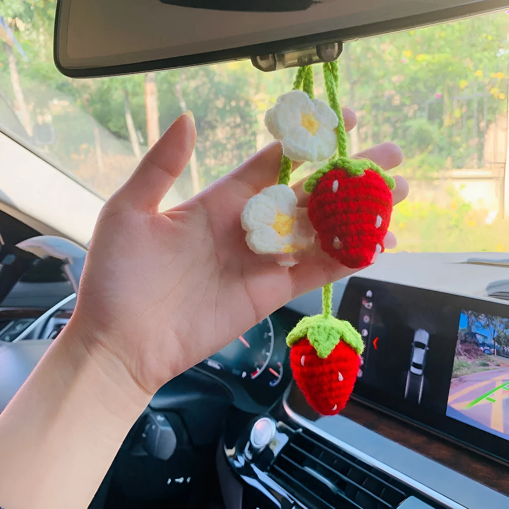 Handmade strawberry-shaped car pendant made from cotton and hemp knitting wool.