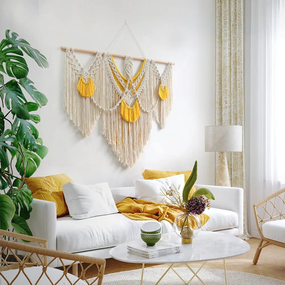 Creamy white hand-woven cotton Nordic tapestry hanging on a wall, rectangular shape 120cm by 95cm.