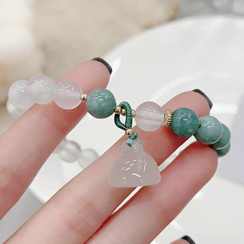 Women's retro Chinese style agate lotus seedpod bracelet with manual craftsmanship and traditional jade accents