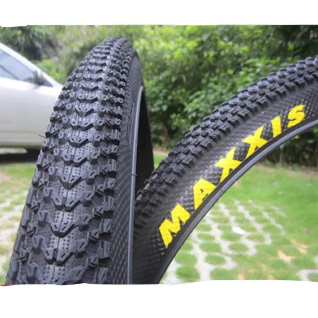 Ultralight black mountain bike tyre with white label option, showing tread pattern and size markings.