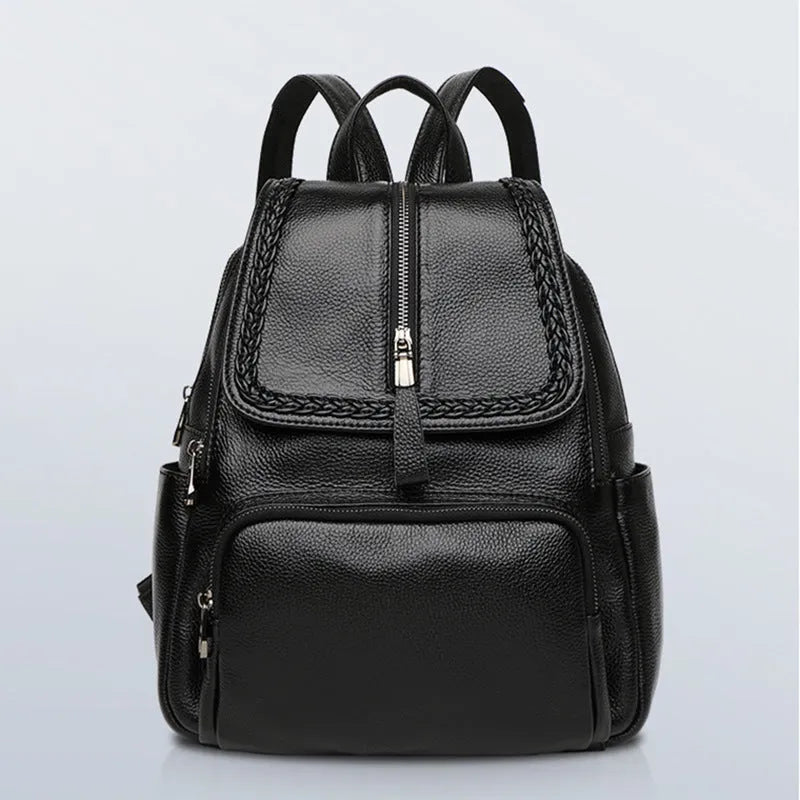 Blue genuine leather women's backpack with outer pocket and internal organiser compartments